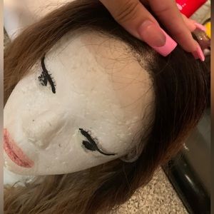 Synthetic heat safe wig.